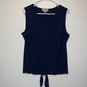 Women's sleeveless v-neck blouse with a tie front